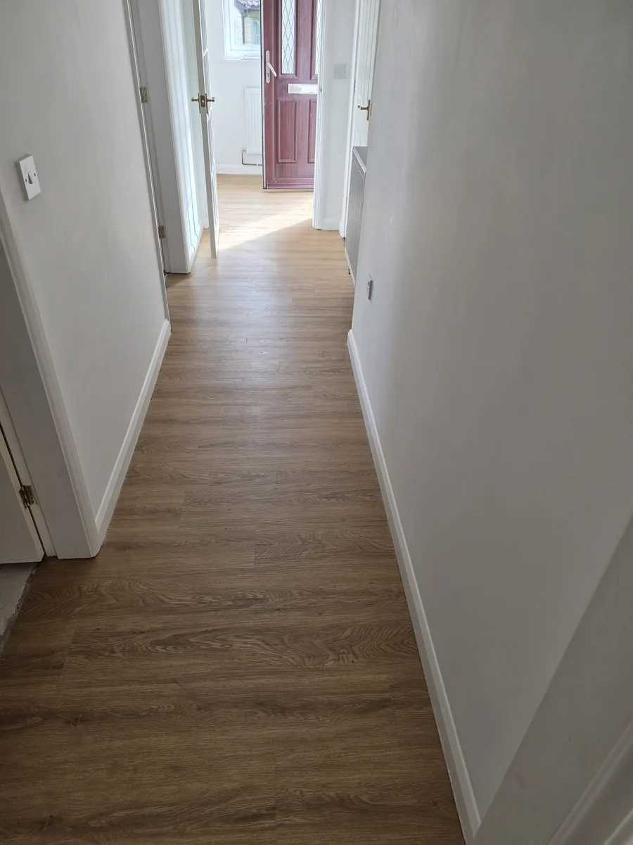 Camaro full-plank LVT in a hallway