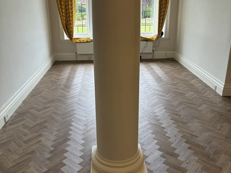 Parquet LVT herringbone in a room with columns in North Yorkshire